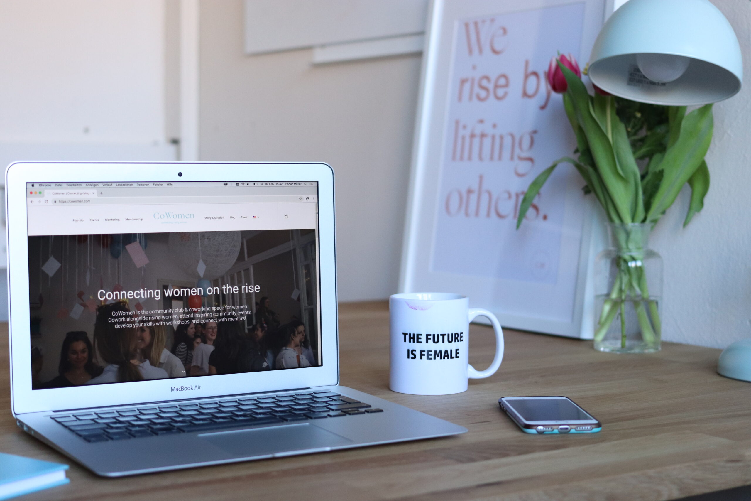 website message | laptop sitting on desk with coffee mug